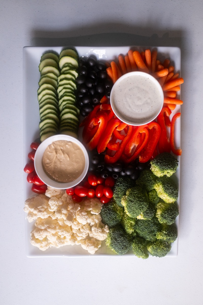Fresh vegetable platter with hummus and ranch